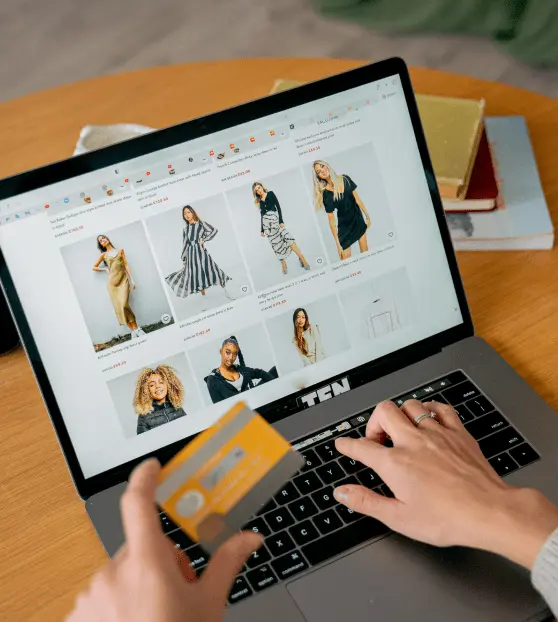 Secure Online Shopping with Credit Card Checkout Online shopping with credit card and laptop